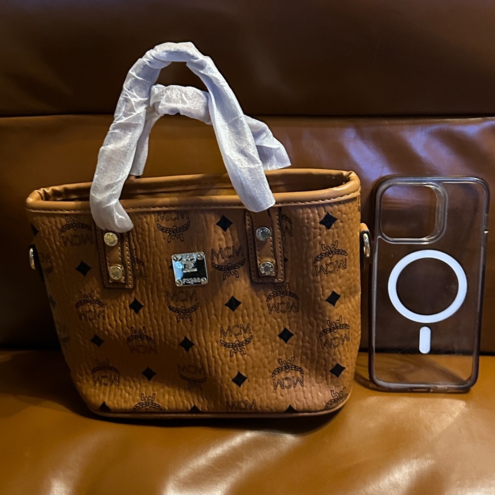 Designer like MCM Cognac Monogram Tote with Gold Accents